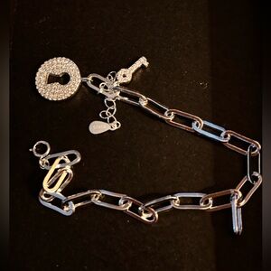Elegant Silver Paperclip Bracelet with Key and Lock Charm